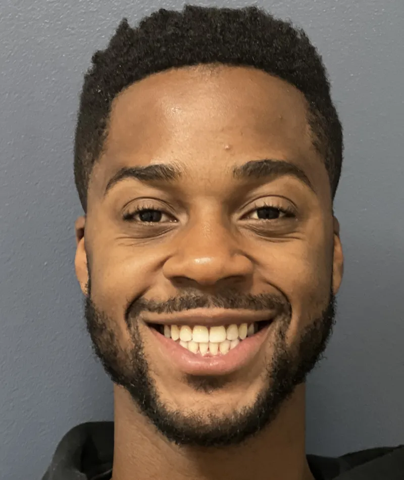 a man smiling for the camera