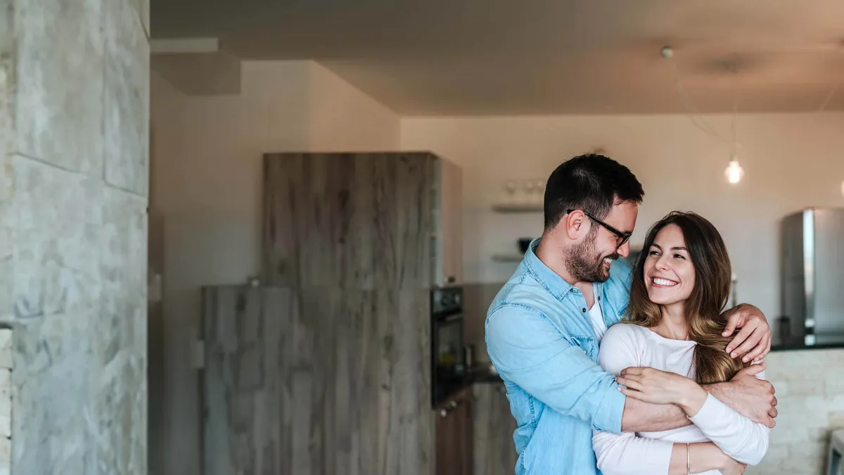 a man and woman hugging