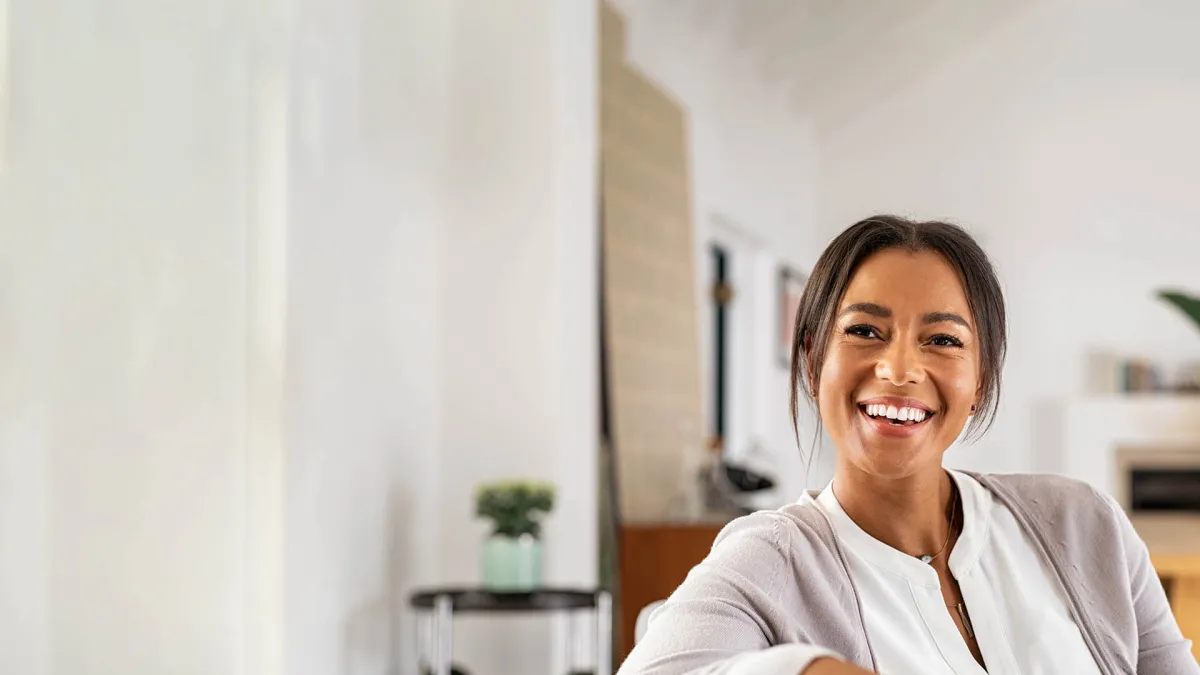 a woman smiling at the camera