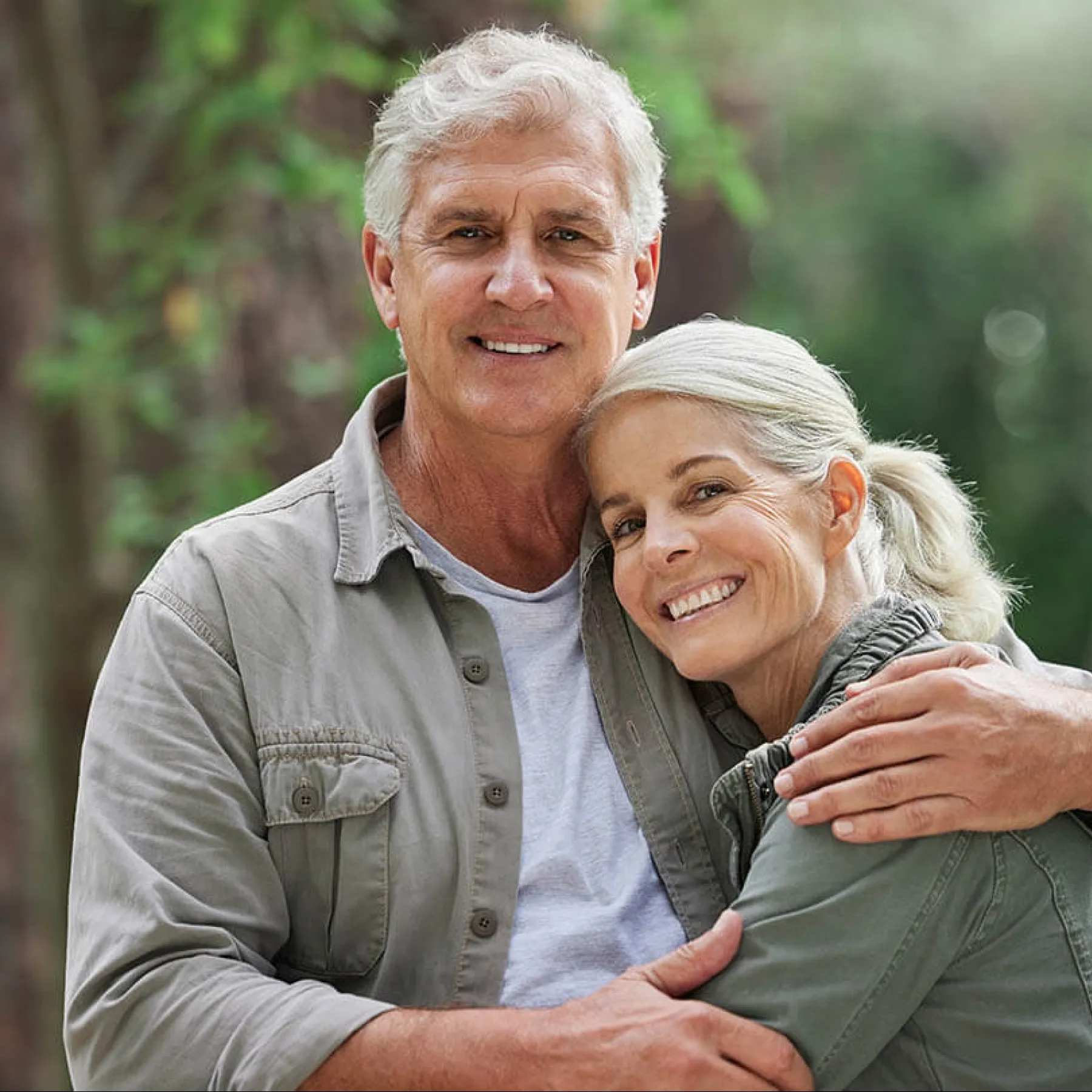 a man and a woman smiling
