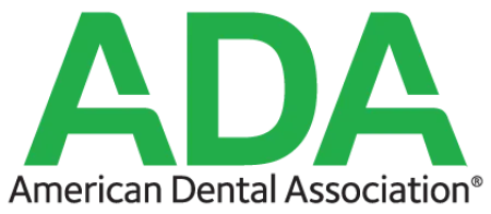Logo of ADA (American Dental Association) featuring bold green letters against a dark background.