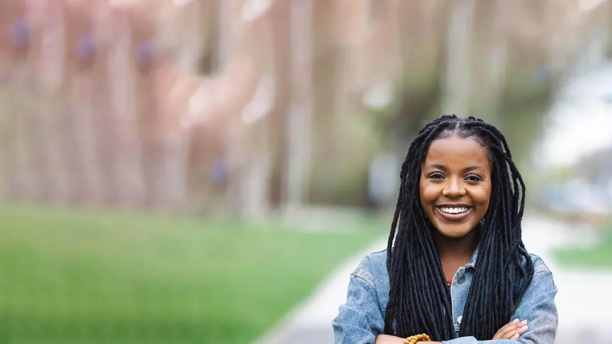 a person smiling outside