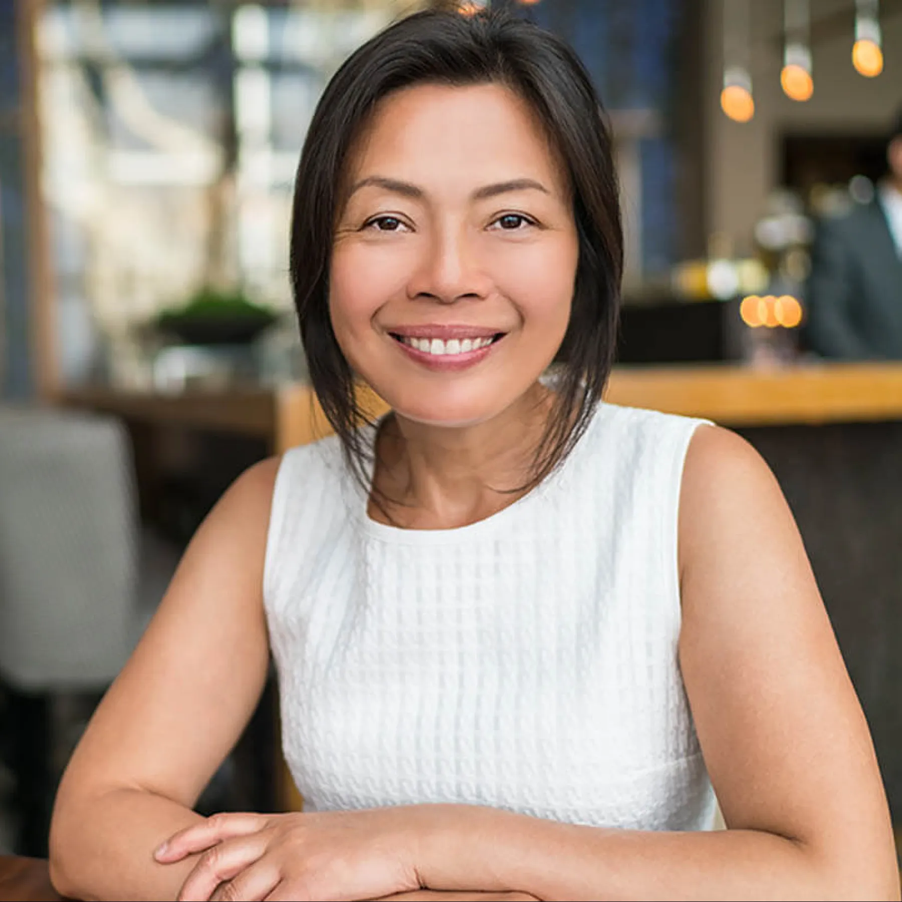 a woman smiling at the camera