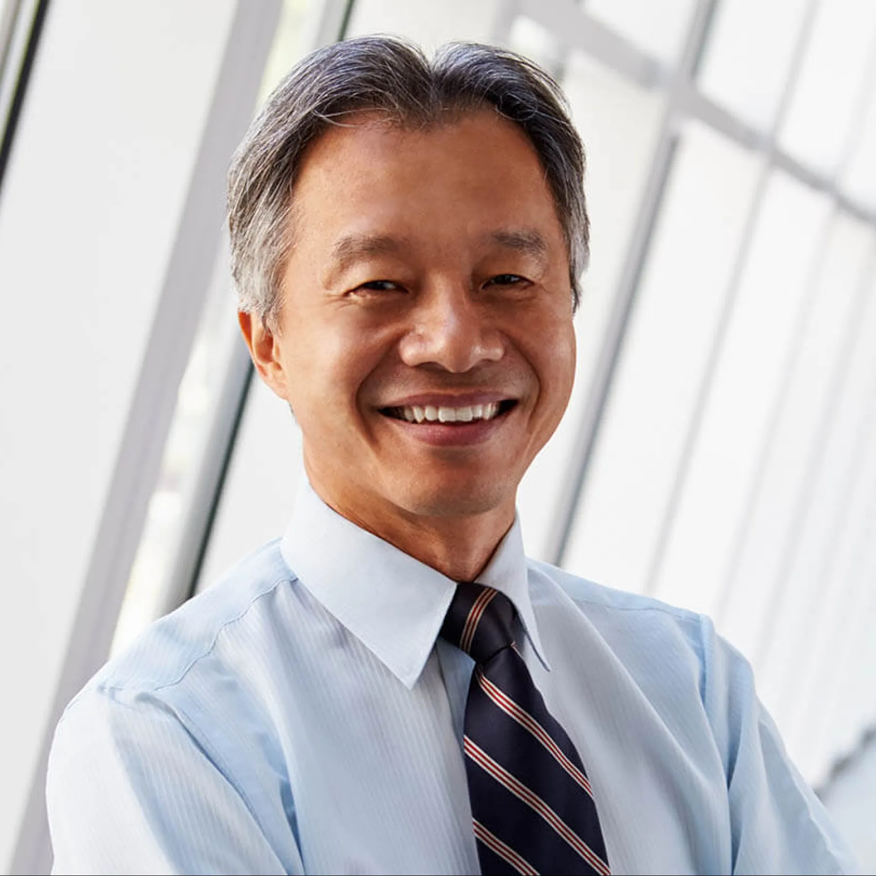 Larry Wang Parrish wearing a tie